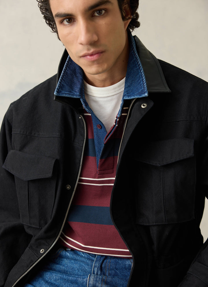 Percival striped rugby shirt with denim collar layered under a jacket