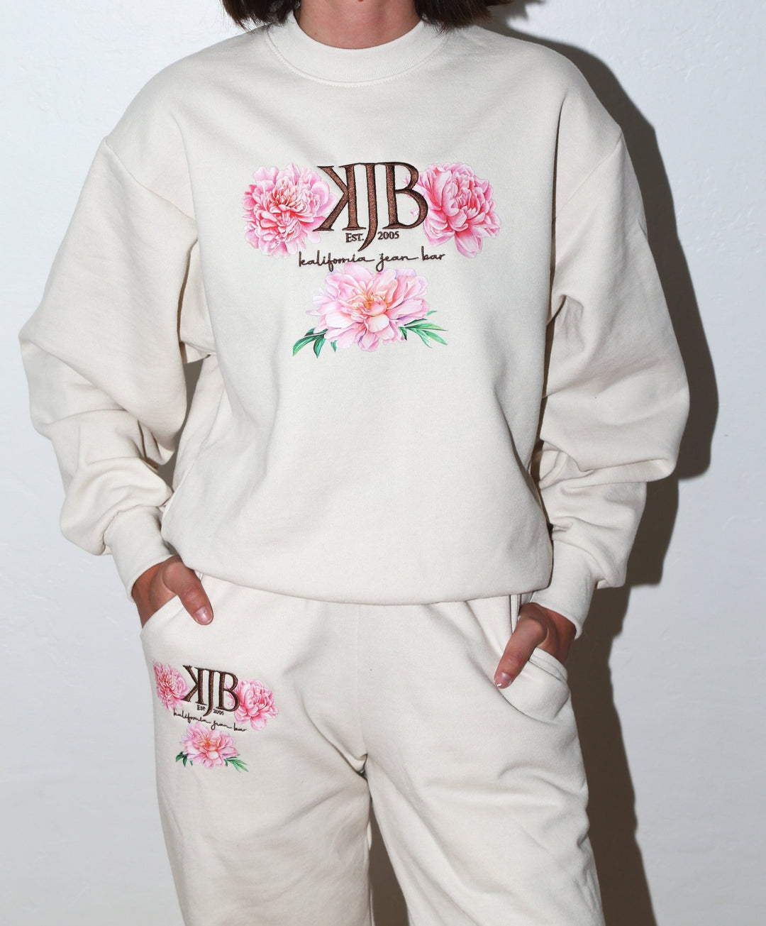 Bronze Embroidered KJB Flower Crewneck in Creme - Kalifornia Jean Bar